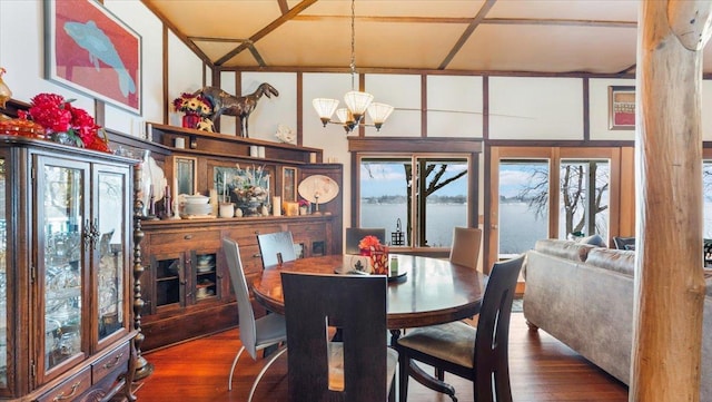 1007 Van Dyke Rd NW, Alexandria, MN 56308 - dining room featuring hardwood / wood-style floors, a chandelier, and a water view