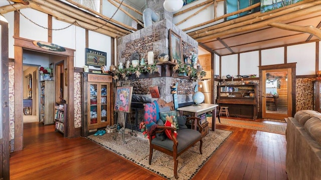 1007 Van Dyke Rd NW, Alexandria, MN 56308 - living room featuring a high ceiling and hardwood / wood-style flooring