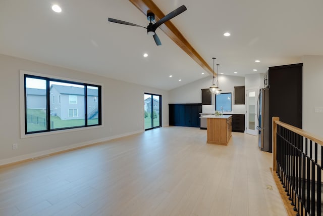 1824 Brandt Dr NE, Byron, MN 55920 - unfurnished living room with a ceiling fan, light wood finished floors, a sink, recessed lighting, and baseboards