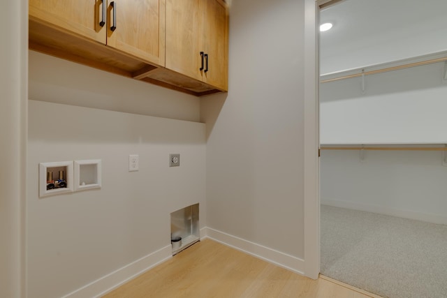 1824 Brandt Dr NE, Byron, MN 55920 - washroom with cabinet space, hookup for a washing machine, hookup for an electric dryer, baseboards, and light wood finished floors