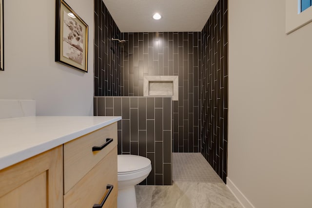 1824 Brandt Dr NE, Byron, MN 55920 - bathroom with vanity, tiled shower, toilet, recessed lighting, and marble finish flooring