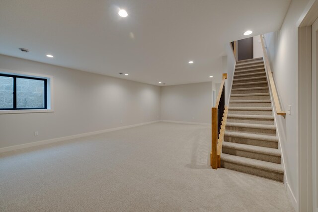 1824 Brandt Dr NE, Byron, MN 55920 - below grade area with stairs, recessed lighting, carpet, and baseboards