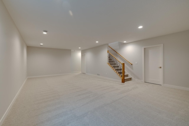 1824 Brandt Dr NE, Byron, MN 55920 - finished basement with light carpet, recessed lighting, stairway, and baseboards