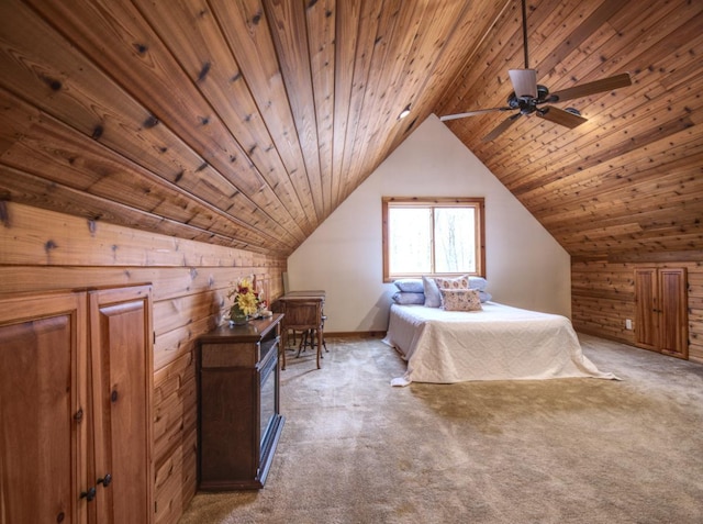 carpeted bedroom featuring wood walls, lofted ceiling, and wooden ceiling