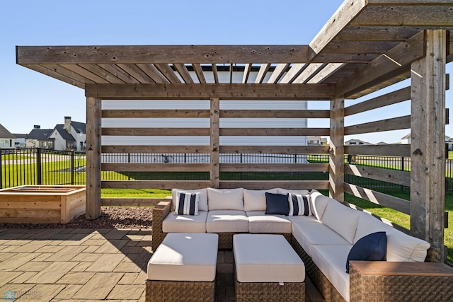 view of patio featuring an outdoor living space and fence