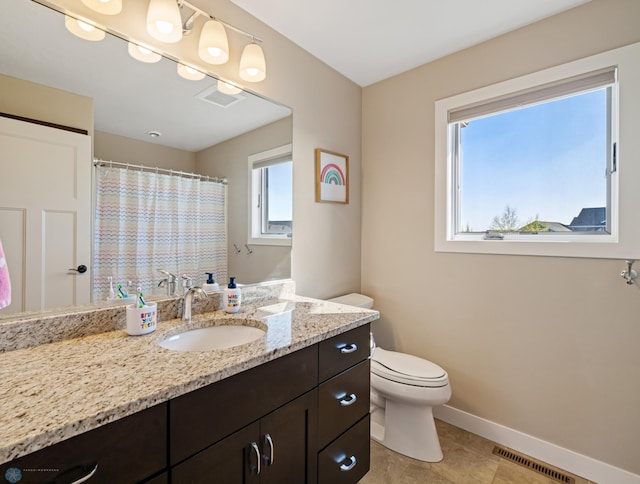 full bath with toilet, baseboards, vanity, tile patterned floors, and a shower with shower curtain