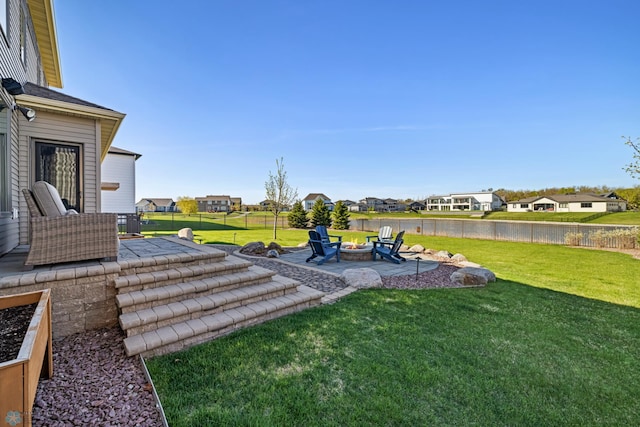 2704 1st St E, West Fargo, ND 58078 - view of yard with an outdoor fire pit, a patio area, and a residential view