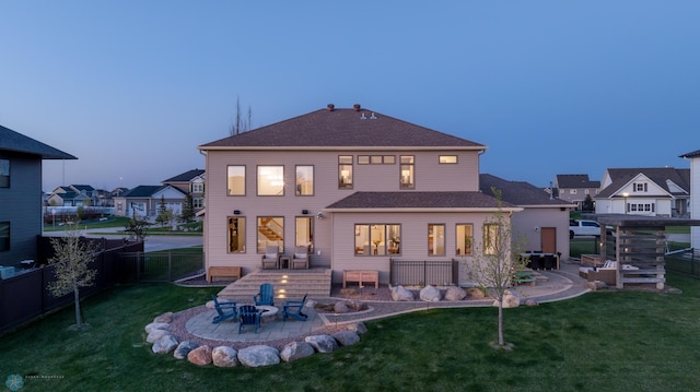 2704 1st St E, West Fargo, ND 58078 - rear view of property with a patio, a fire pit, and a residential view