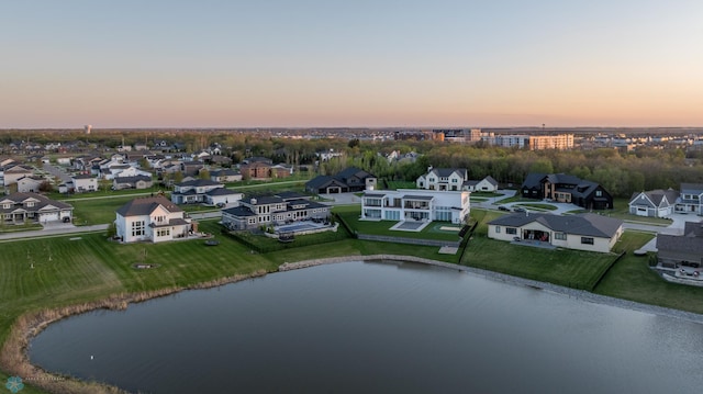 2704 1st St E, West Fargo, ND 58078 - aerial view at dusk of a water view and a residential view