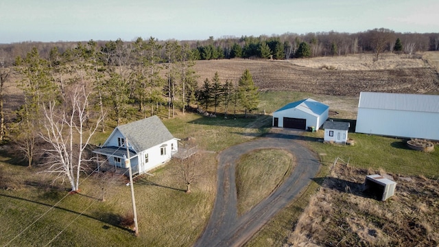 birds eye view of property featuring a rural view