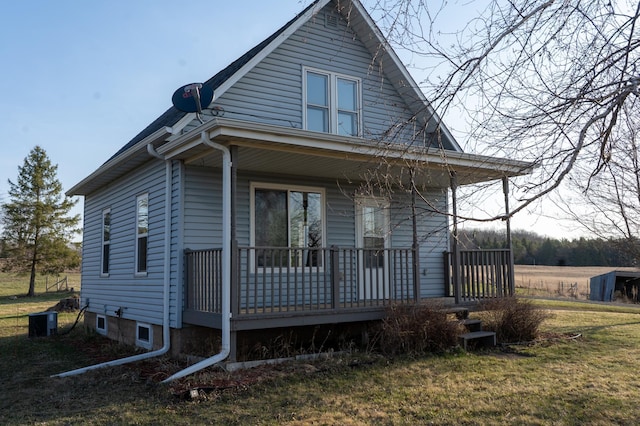 exterior space featuring covered porch and central air condition unit