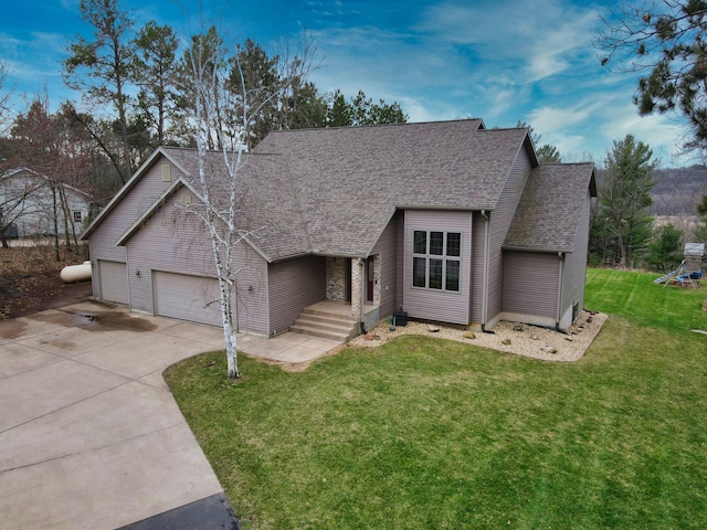N1698 945th St, Rock Creek Twp, WI 54701 - view of front of property with a front lawn, driveway, roof with shingles, and an attached garage