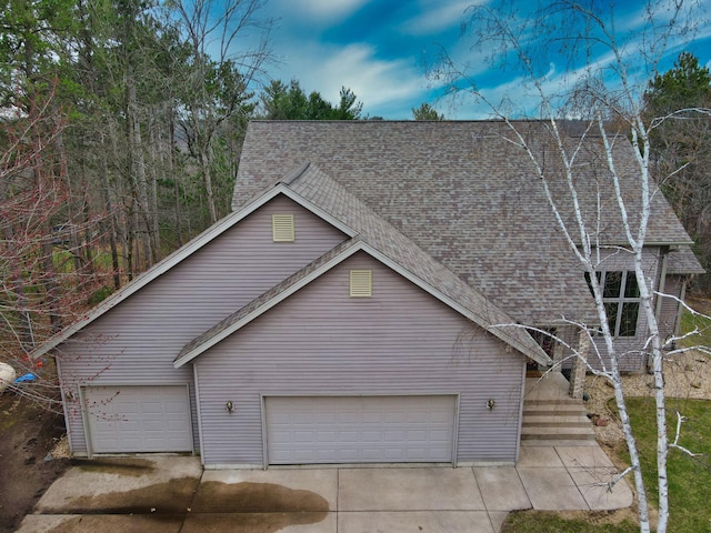 N1698 945th St, Rock Creek Twp, WI 54701 - view of front of home with concrete driveway and roof with shingles