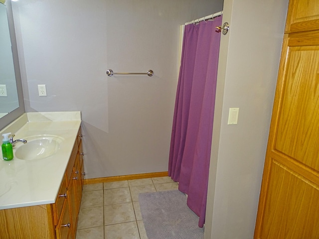 N1698 945th St, Rock Creek Twp, WI 54701 - full bathroom with baseboards, curtained shower, vanity, and tile patterned flooring