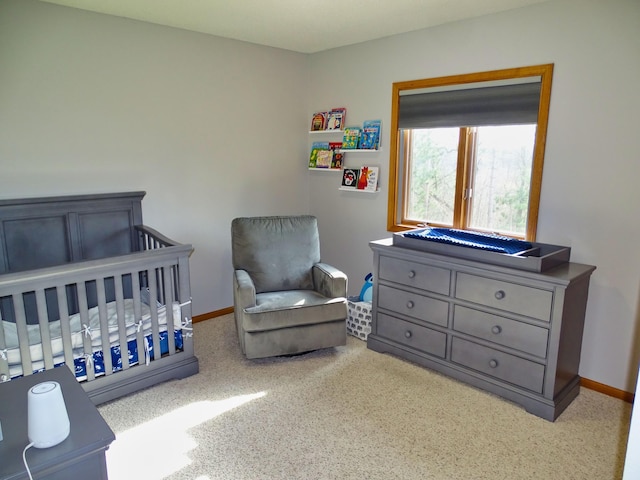 N1698 945th St, Rock Creek Twp, WI 54701 - bedroom featuring a crib and baseboards