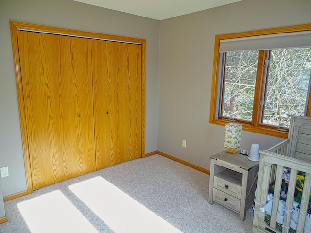 N1698 945th St, Rock Creek Twp, WI 54701 - carpeted bedroom featuring a closet and baseboards