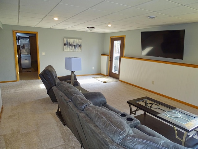 N1698 945th St, Rock Creek Twp, WI 54701 - living area featuring wainscoting, baseboards, carpet flooring, and a paneled ceiling