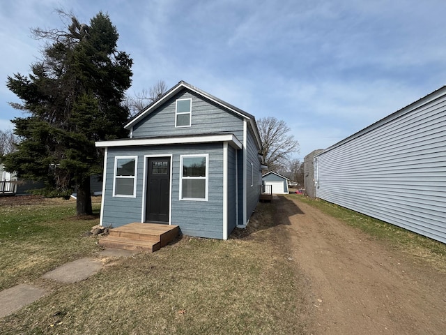 115 Prentice St, Clayton, WI 54004 - view of outbuilding with driveway and an outdoor structure