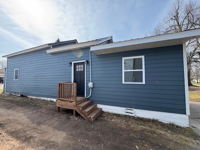 115 Prentice St, Clayton, WI 54004 - back of property featuring crawl space and metal roof