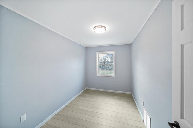 115 Prentice St, Clayton, WI 54004 - unfurnished room with baseboards, visible vents, and light wood finished floors