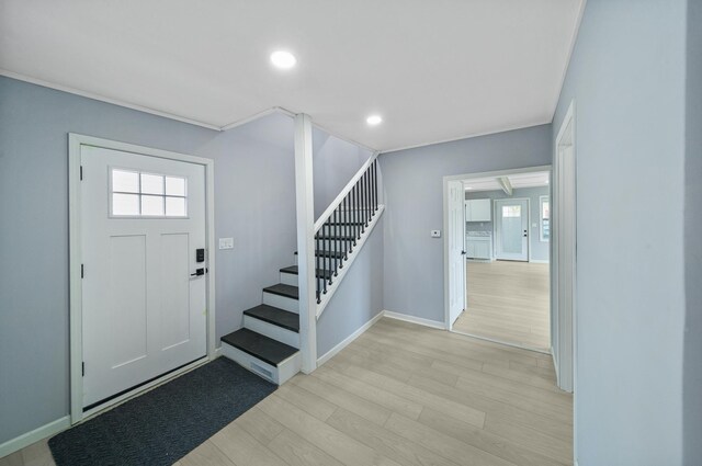 115 Prentice St, Clayton, WI 54004 - entryway with recessed lighting, light wood-type flooring, baseboards, and stairs