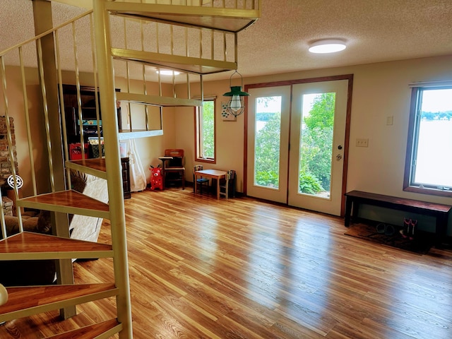 5060 Condons St SE, Prior Lake, MN 55372 - living area with wood finished floors and a textured ceiling