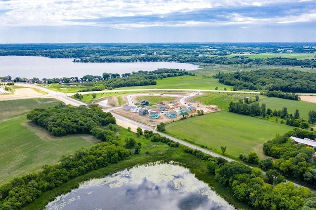 bird's eye view featuring a water view and a rural view