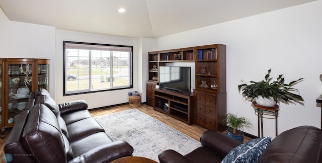 3497 50th St S, Fargo, ND 58104 - living area with light wood finished floors, lofted ceiling, and recessed lighting