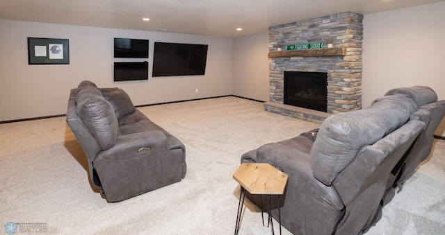 3497 50th St S, Fargo, ND 58104 - carpeted living room featuring a stone fireplace, baseboards, and recessed lighting