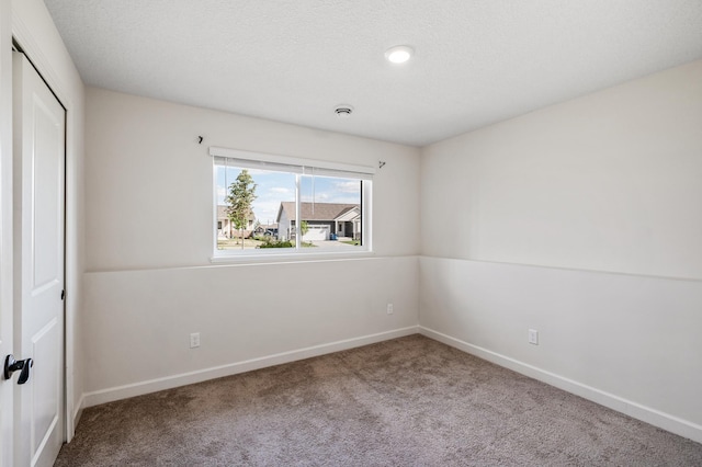 18872 Fillmore St NW, Elk River, MN 55330 - unfurnished room with carpet flooring and baseboards