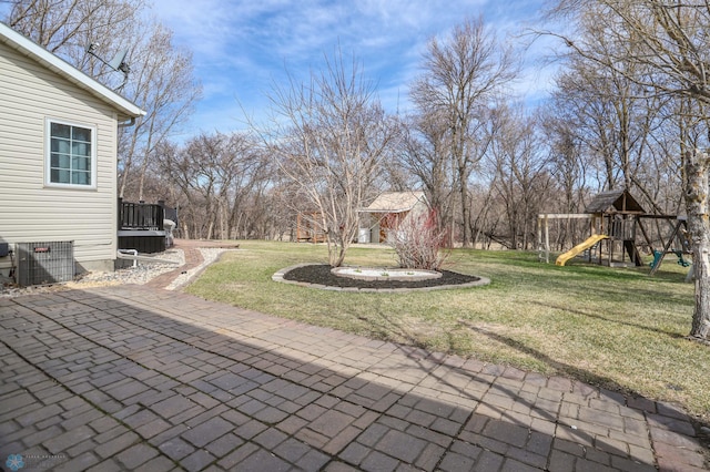 1311 Cossette Dr S, Fargo, ND 58104 - view of patio / terrace featuring a playground