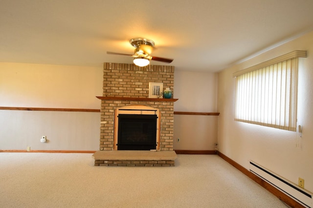 unfurnished living room with carpet, a ceiling fan, baseboards, a brick fireplace, and baseboard heating