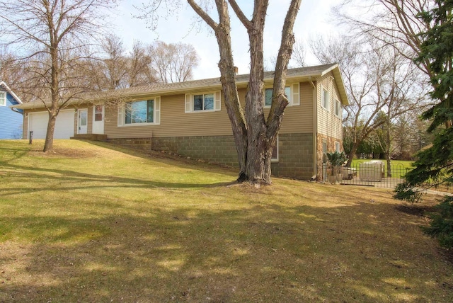 back of property with cooling unit, an attached garage, fence, and a lawn
