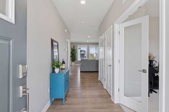 2141 Johanna Cir, Lino Lakes, MN 55038 - hall with baseboards, recessed lighting, and light wood-style flooring