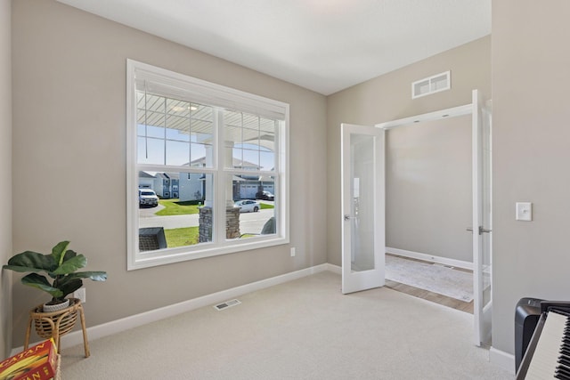 2141 Johanna Cir, Lino Lakes, MN 55038 - bedroom with carpet flooring, baseboards, visible vents, and french doors