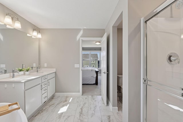 2141 Johanna Cir, Lino Lakes, MN 55038 - full bath with baseboards, a sink, marble finish floor, and a shower stall