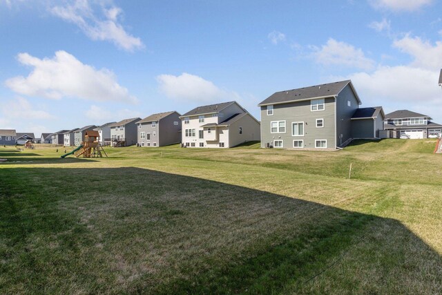 2141 Johanna Cir, Lino Lakes, MN 55038 - view of yard featuring a residential view and playground community
