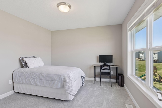 2141 Johanna Cir, Lino Lakes, MN 55038 - carpeted bedroom with baseboards, visible vents, and multiple windows