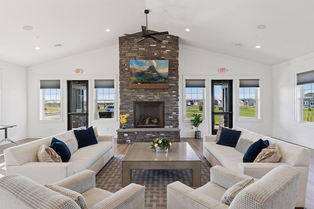 2141 Johanna Cir, Lino Lakes, MN 55038 - living room with a fireplace, wood finished floors, baseboards, high vaulted ceiling, and recessed lighting