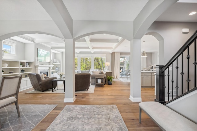 4233 Halstead Bay Alcove, Minnetrista, MN 55331 - entryway with coffered ceiling, plenty of natural light, beam ceiling, stairway, and light wood finished floors