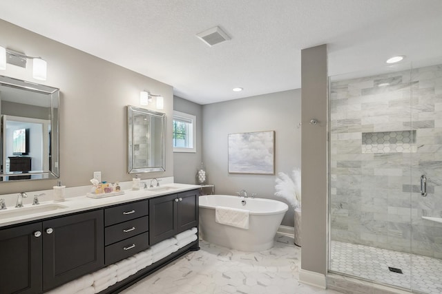 4233 Halstead Bay Alcove, Minnetrista, MN 55331 - full bath featuring a shower stall, a soaking tub, marble look tiles, double vanity, and recessed lighting