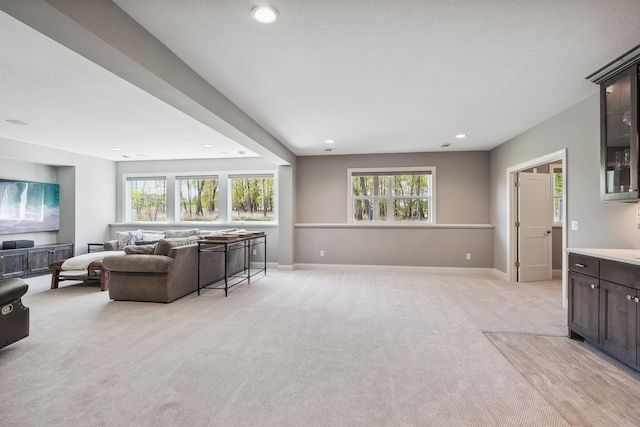 4233 Halstead Bay Alcove, Minnetrista, MN 55331 - living room featuring light colored carpet, recessed lighting, and baseboards