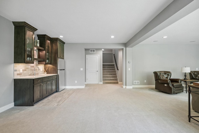 4233 Halstead Bay Alcove, Minnetrista, MN 55331 - living area with stairs, light carpet, baseboards, recessed lighting, and wet bar