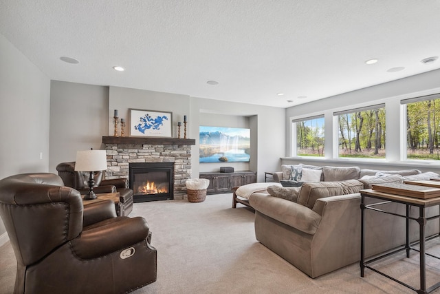 4233 Halstead Bay Alcove, Minnetrista, MN 55331 - carpeted living area with a stone fireplace, plenty of natural light, and recessed lighting