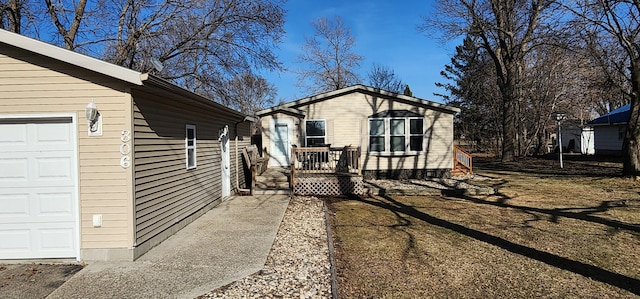 306 4th St S, Hoffman, MN 56339 - view of side of property with an attached garage