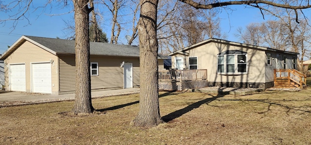 306 4th St S, Hoffman, MN 56339 - view of property exterior featuring a deck and an attached garage