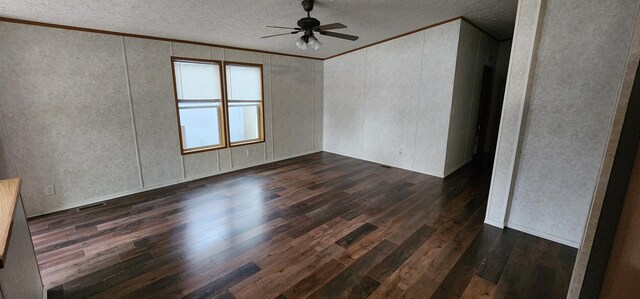 306 4th St S, Hoffman, MN 56339 - unfurnished room with ornamental molding, wood finished floors, a textured ceiling, and a ceiling fan