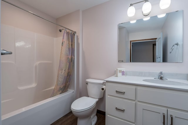 209 Plum Run, Le Sueur, MN 56058 - full bath with toilet, wood finished floors, vanity, and shower / bath combination with curtain