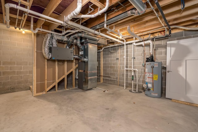209 Plum Run, Le Sueur, MN 56058 - unfinished below grade area with water heater, heating unit, and concrete block wall