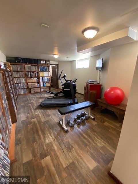 exercise area with wood finished floors